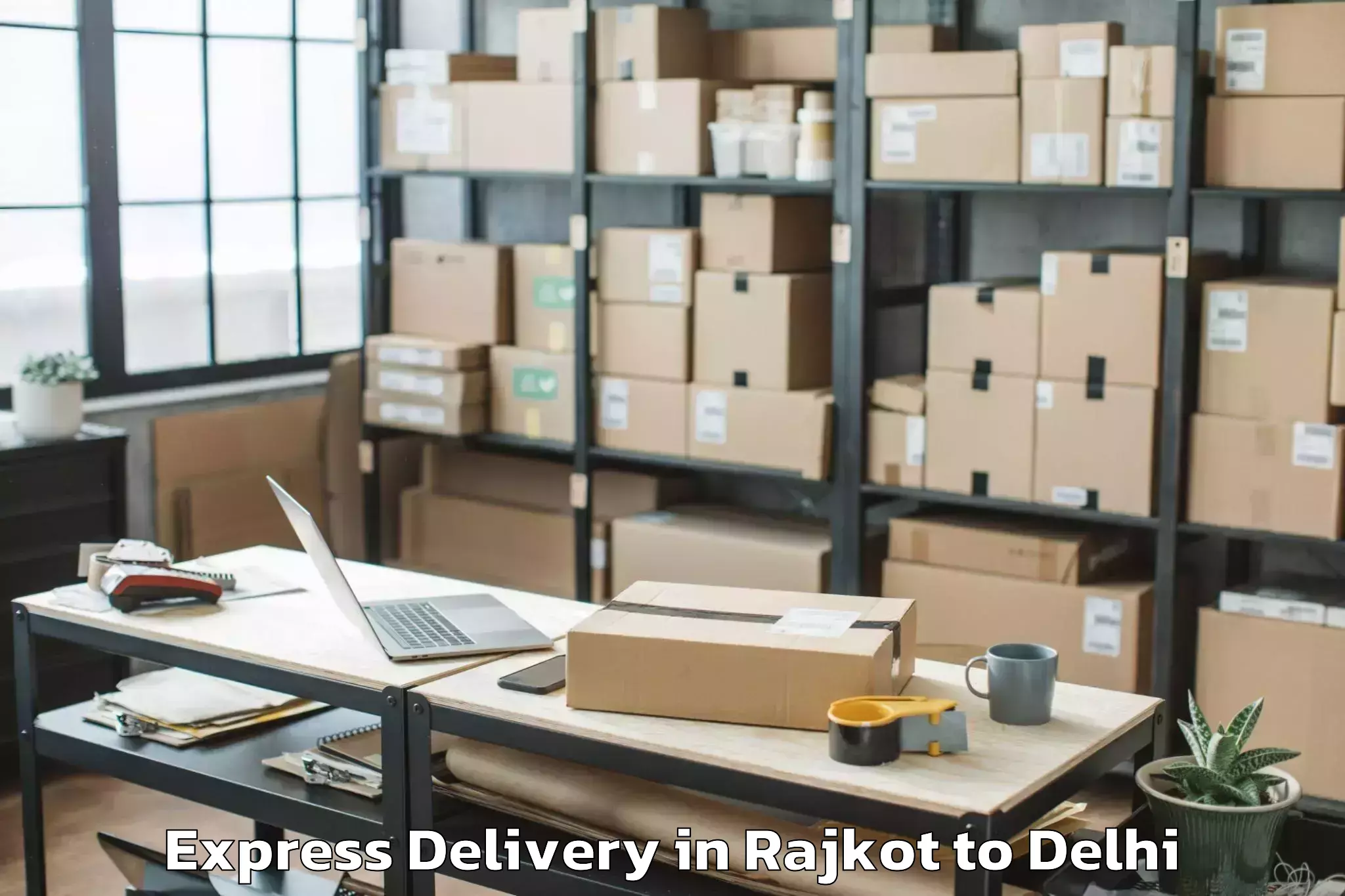 Easy Rajkot to Naraina Industrial Estate Express Delivery Booking